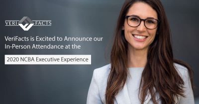 Smiling confident women wearing glasses looking in camera